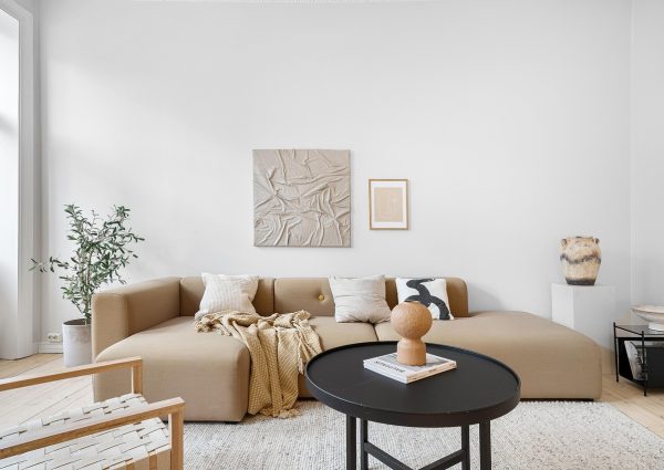 real estate, sofa, living room, table, interior, house, luxury, floor, wooden, chair, decor, pillow, cabinet, view, window, art, design, hallway, lamp, carpet, home